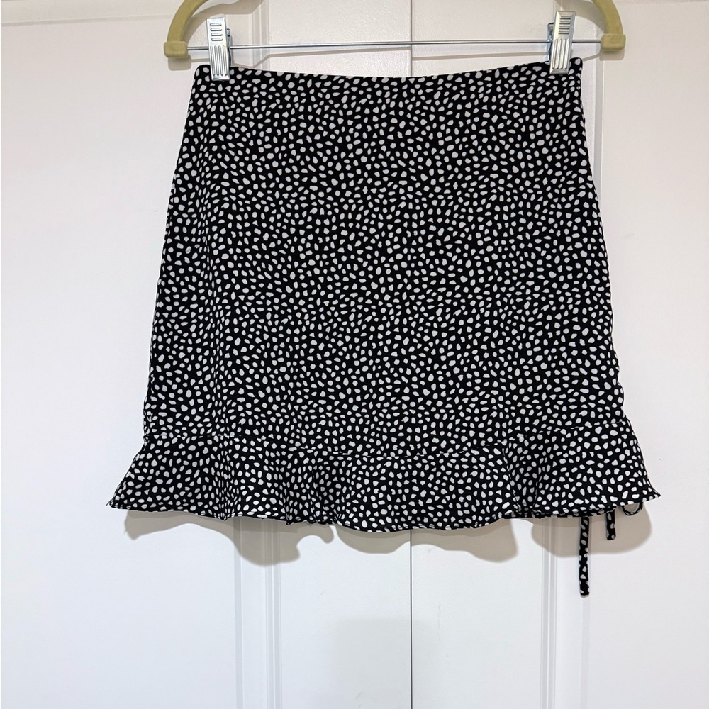 Black and White Polka Dot Mini Skirt with Ruffle Hem Lined